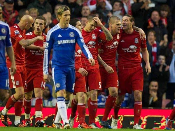 LIVERPOOL, ENGLAND - Tuesday, May 8, 2012: Liverpool's Daniel Agger celebrates scoring the third goal as Chelsea's Fernando Torres looks dejected during the final home Premiership match of the season at Anfield. (Pic by David Rawcliffe/Propaganda)