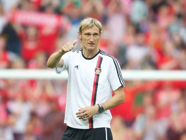 LIVERPOOL, ENGLAND - Sunday, August 12, 2012: Bayer 04 Leverkusen's manager Sami Hyypia applauds the supporters after his side's 3-1 defeat by former club Liverpool during a preseason friendly match at Anfield. (Pic by David Rawcliffe/Propaganda)