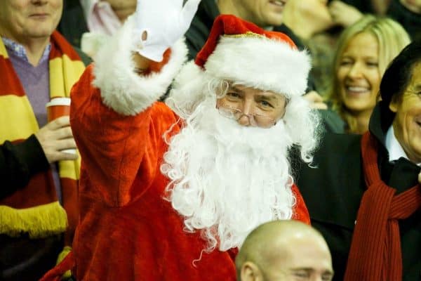 LIVERPOOL, ENGLAND - Saturday, December 22, 2012: A Liverpool supporter dressed as Father Christmas (Santa Claus, St Nicholas) during the Premiership match against Fulham at Anfield. (Pic by David Rawcliffe/Propaganda)