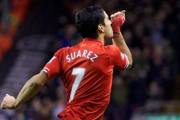 LIVERPOOL, ENGLAND - Wednesday, January 1, 2014: Liverpool's Luis Suarez celebrates scoring the second goal against Hull City during the Premiership match at Anfield. (Pic by David Rawcliffe/Propaganda)