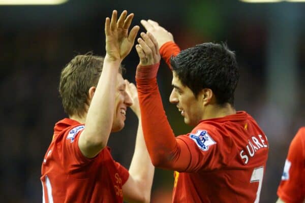 LIVERPOOL, ENGLAND - Wednesday, January 2, 2013: Liverpool's Luis Alberto Suarez Diaz celebrates scoring the third goal against Sunderland with team-mate Lucas Leiva during the Premiership match at Anfield. (Pic by David Rawcliffe/Propaganda)