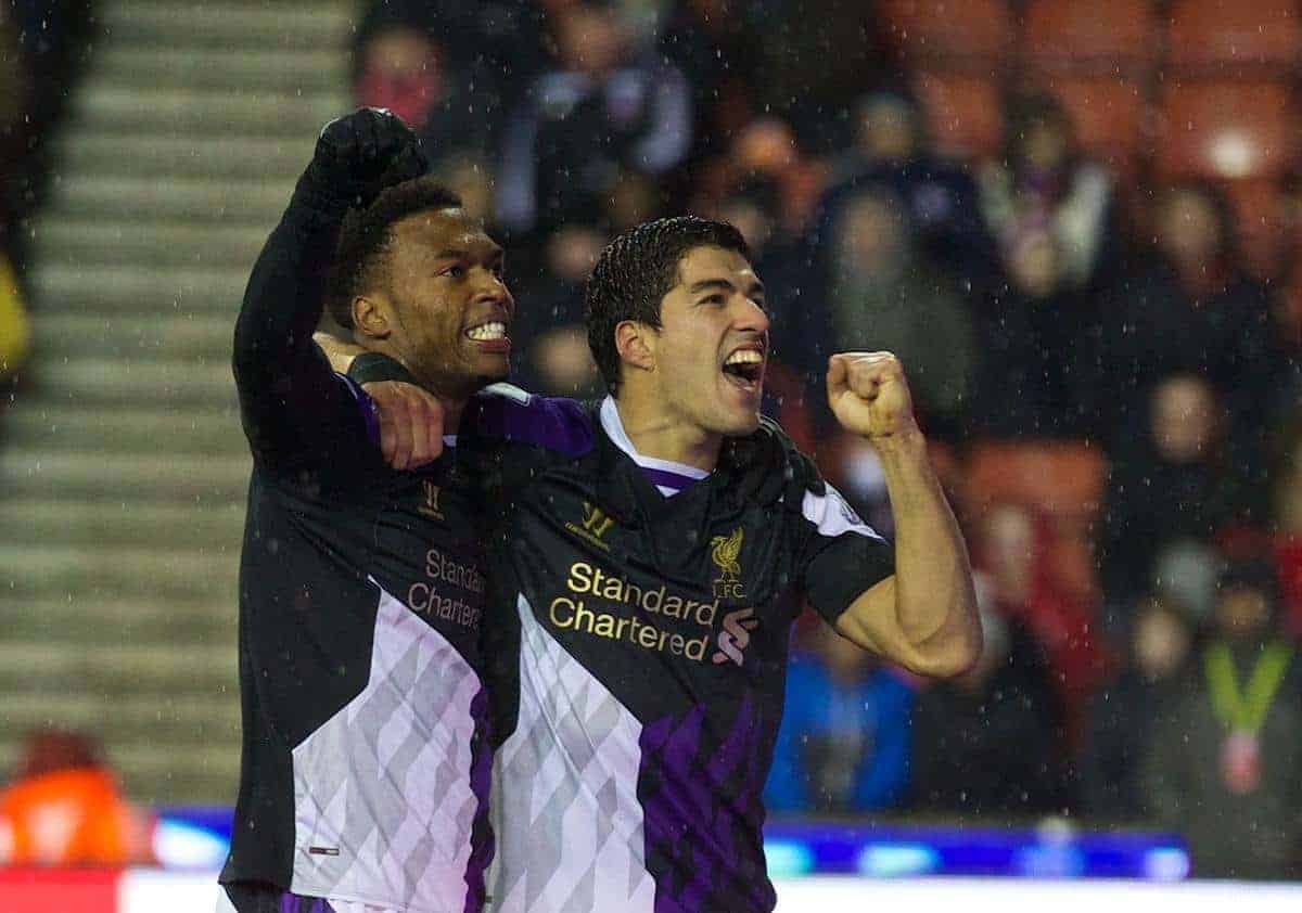 STOKE-ON-TRENT, ENGLAND - Sunday, January 12, 2014: Liverpool's Luis Suarez celebrates scoring the fourth goal against Stoke City, with team-mate Daniel Sturridge, during the Premiership match at the Britannia Stadium. (Pic by David Rawcliffe/Propaganda)