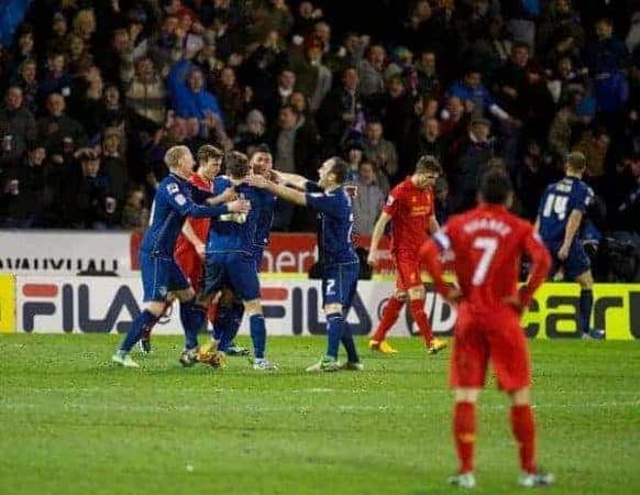 OLDHAM, ENGLAND - Sunday, January 27, 2013: Oldham Athletic's Reece Wabara celebrates scoring the third goal against Liverpool during the FA Cup 4th Round match at Boundary Park. (Pic by David Rawcliffe/Propaganda)