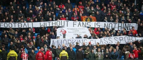 MANCHESTER, ENGLAND - Sunday, February 3, 2013: Liverpool fans protest against high ticket prices with banners 'A Working Class Sport?', 'Football Without Fans Is Nothing' during the Premiership match against Manchester City at the City of Manchester Stadium. (Pic by David Rawcliffe/Propaganda)