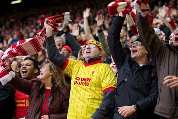 LIVERPOOL, ENGLAND - Saturday, February 8, 2014: Liverpool supporters celebrate as they watch the Reds thrash Arsenal 5-1 during the Premiership match at Anfield. (Pic by David Rawcliffe/Propaganda)