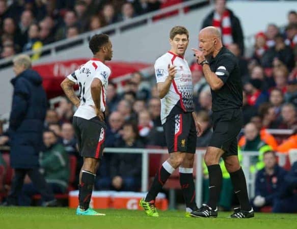 LONDON, ENGLAND - Sunday, February 16, 2014: Referee Howard Webb warns Liverpool's captain Steven Gerrard about Raheem Sterling during the FA Cup 5th Round match against Arsenal at the Emirates Stadium. (Pic by David Rawcliffe/Propaganda)