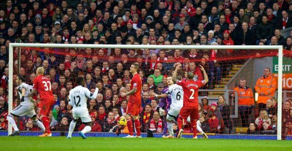 LIVERPOOL, ENGLAND - Sunday, February 23, 2014: Liverpool's Martin Skrtel scores an own-goal as Swansea City level the score 2-2 during the Premiership match at Anfield. (Pic by David Rawcliffe/Propaganda)