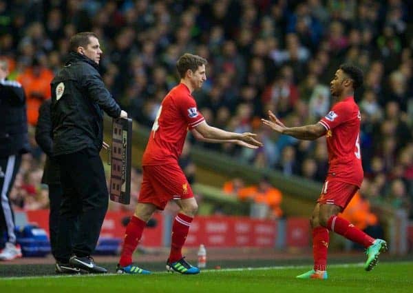 LIVERPOOL, ENGLAND - Sunday, February 23, 2014: Liverpool's Raheem Sterling is replaced by substitute Joe Allen during the Premiership match against Swansea City at Anfield. (Pic by David Rawcliffe/Propaganda)