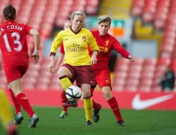 LIVERPOOL, ENGLAND - Friday, April 26, 2013: Liverpool's Katrin Omarsdottir in action against Arsenal's Gemma Davison during the FA Women's Cup Semi-Final match at Anfield. (Pic by David Rawcliffe/Propaganda)