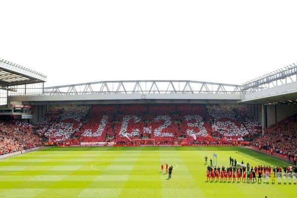LIVERPOOL, ENGLAND - Sunday, May 19, 2013: Liverpool supporters on the Spion Kop hold up a mosaic 'JC 23' and players form a guard of honour on the pitch for captain Jamie Carragher who made his 737th and final appearance for the Reds during the final Premiership match against Queens Park Rangers of the 2012/13 season at Anfield. (Pic by David Rawcliffe/Propaganda)