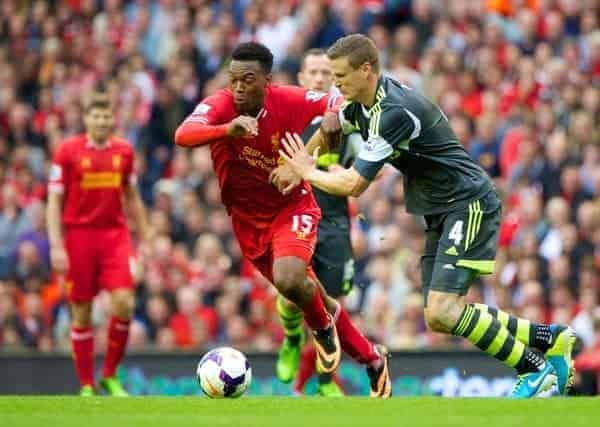 LIVERPOOL, ENGLAND - Saturday, August 17, 2013: Liverpool's Daniel Sturridge and Stoke City's Robert Huth during the Premiership match at Anfield. (Pic by David Rawcliffe/Propaganda)