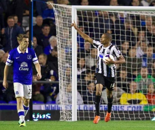 LIVERPOOL, ENGLAND - Monday, September 30, 2013: Newcastle United's Loic Remy celebrates scoring the second goal against Everton during the Premiership match at Goodison Park. (Pic by David Rawcliffe/Propaganda)