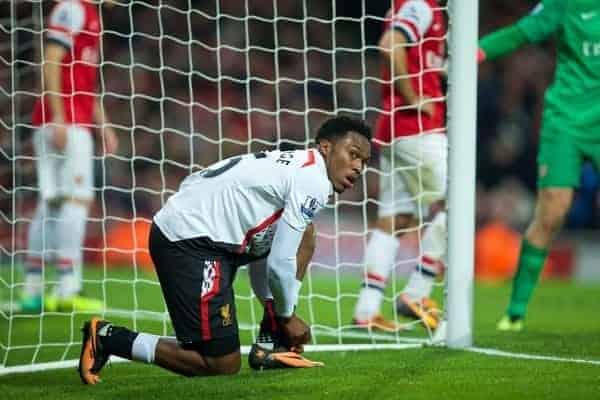 LONDON, ENGLAND - Saturday, November 2, 2013: Liverpool's Daniel Sturridge ties his boot laces against Arsenal during the Premiership match at the Emirates Stadium. (Pic by David Rawcliffe/Propaganda)