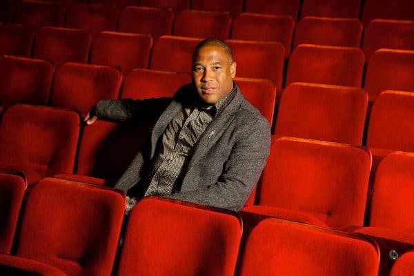 LIVERPOOL, ENGLAND - Tuesday, December 3, 2013: Former Liverpool and England player John Barnes sits in the seats at the Epstein Theatre in Liverpool before his one man show - An Audience with Liverpool Legend John Barnes. (Pic by David Rawcliffe/Propaganda)