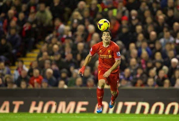 LIVERPOOL, ENGLAND - Wednesday, December 4, 2013: Liverpool's Luis Suarez on his way to scoring his third goal against Norwich City during the Premiership match at Anfield. (Pic by David Rawcliffe/Propaganda)