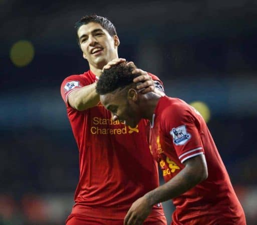 LONDON, ENGLAND - Sunday, December 15, 2013: Liverpool's Raheem Sterling celebrates scoring the fifth goal against Tottenham Hotspur with team-mate captain Luis Suarez during the Premiership match at White Hart Lane. (Pic by David Rawcliffe/Propaganda)