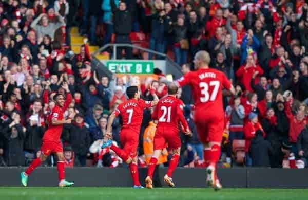 LIVERPOOL, ENGLAND - Saturday, December 21, 2013: Liverpool's Luis Suarez celebrates scoring the third goal against Cardiff City, his second of the game, during the Premiership match at Anfield. (Pic by David Rawcliffe/Propaganda)