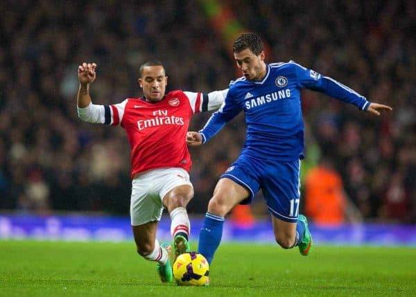 LONDON, ENGLAND - Monday, December 23, 2013: Arsenal's Theo Walcott in action against Chelsea's Eden Hazard during the Premiership match at the Emirates Stadium. (Pic by David Rawcliffe/Propaganda)