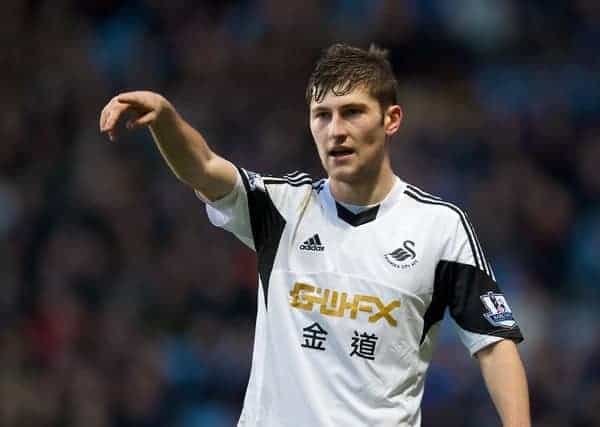 LIVERPOOL, ENGLAND - Saturday, December 28, 2013: Swansea City's Ben Davies in action against Aston Villa during the Premiership match at Villa Park. (Pic by David Rawcliffe/Propaganda)