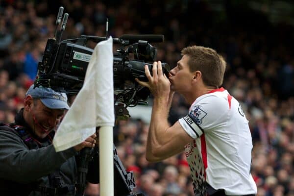 MANCHESTER, ENGLAND - Sunday, March 16, 2014: Liverpool's captain Steven Gerrard celebrates scoring the second goal against Manchester United from the penalty spot by kissing the television camera during the Premiership match at Old Trafford. (Pic by David Rawcliffe/Propaganda)