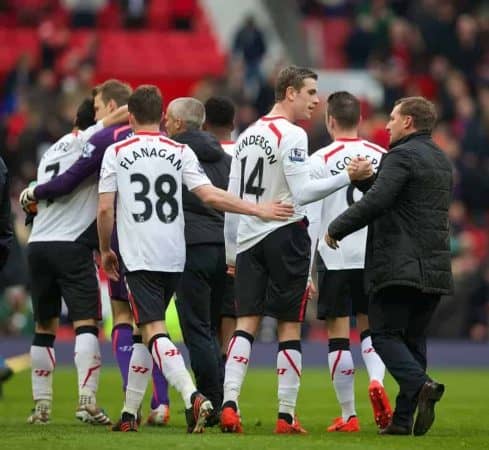 MANCHESTER, ENGLAND - Sunday, March 16, 2014: Liverpool's Jordan Henderson and manager Brendan Rodgers celebrate after a 3-0 victory over Manchester United during the Premiership match at Old Trafford. (Pic by David Rawcliffe/Propaganda)