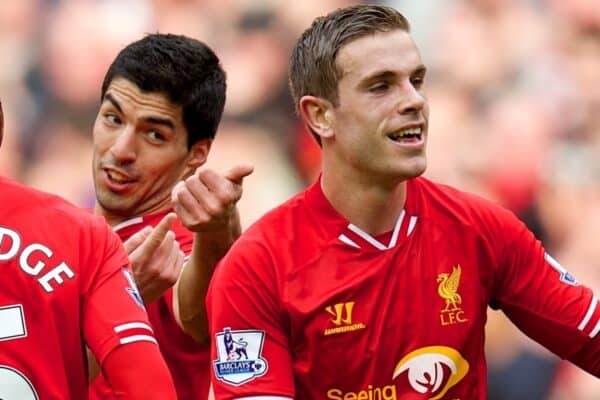 LIVERPOOL, ENGLAND - Sunday, March 30, 2014: It was his idea... Liverpool's Luis Suarez celebrates scoring the fourth goal against Tottenham Hotspur after a free-kick from Jordan Henderson during the Premiership match at Anfield. (Pic by David Rawcliffe/Propaganda)