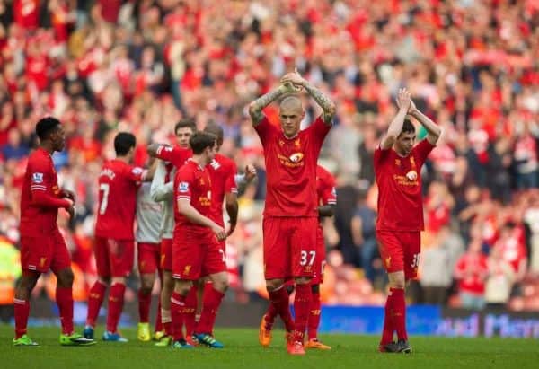 LIVERPOOL, ENGLAND - Sunday, March 30, 2014: Liverpool's Martin Skrtel celebrates his side's 4-0 victory over Tottenham Hotspur during the Premiership match at Anfield. (Pic by David Rawcliffe/Propaganda)