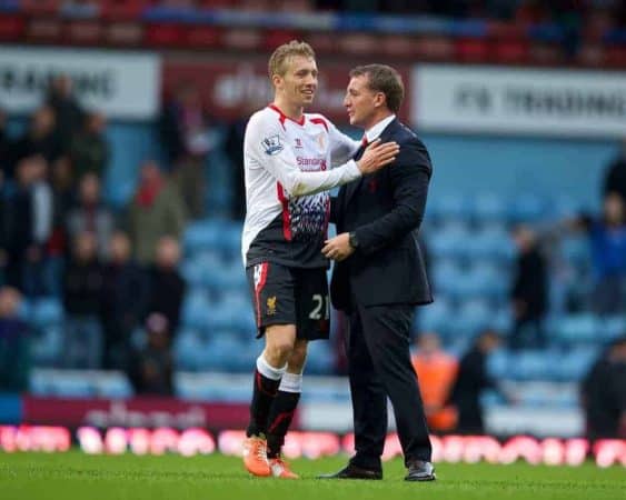 LONDON, ENGLAND - Sunday, April 6, 2014: Liverpool's Lucas Leiva celebrates with manager Brendan Rodgers after beating West Ham United 2-1 during the Premiership match at Upton Park. (Pic by David Rawcliffe/Propaganda)