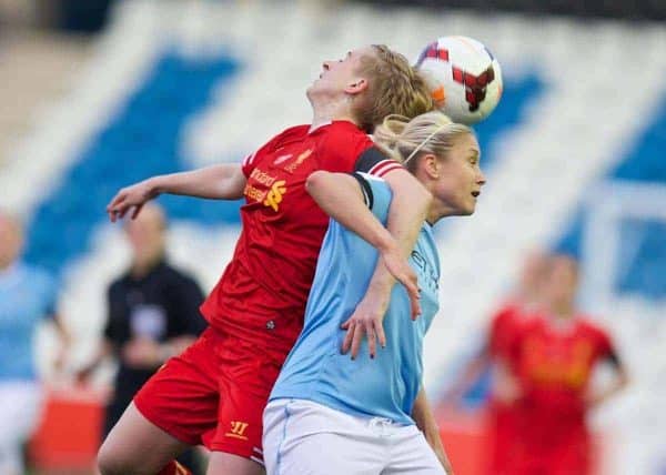 WIDNES, ENGLAND - Thursday, April 17, 2014: Liverpool Ladies' Natasha Dowie in action against Manchester City Ladies captain Steph Houghton during the FA Women's Super League match at the Halton Stadium. (Pic by David Rawcliffe/Propaganda)