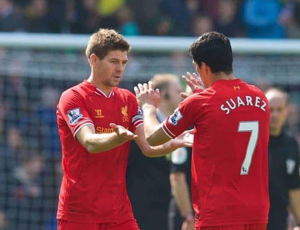 NORWICH, ENGLAND - Sunday, April 20, 2014: Liverpool's captain Steven Gerrard and Luis Suarez celebrate their side's 3-2 victory over Norwich City during the Premiership match at Carrow Road. (Pic by David Rawcliffe/Propaganda)