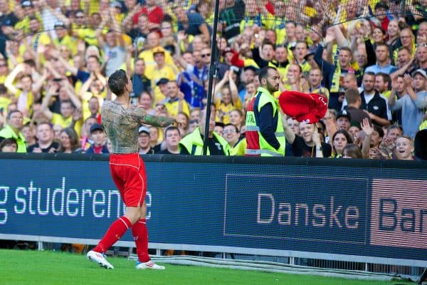 COPENHAGEN, DENMARK - Wednesday, July 16, 2014: Liverpool's Daniel Agger shows off his tattoos after throwing his shirt into the crowd during a preseason friendly match against Brøndby IF at Brøndby Stadion. (Pic by David Rawcliffe/Propaganda)