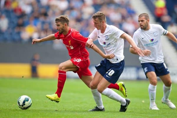 PRESTON, ENGLAND - Saturday, July 19, 2014: Liverpool's Fabio Borini in action against Preston North End's Ben Davies during a preseason friendly match at Deepdale Stadium. (Pic by David Rawcliffe/Propaganda)