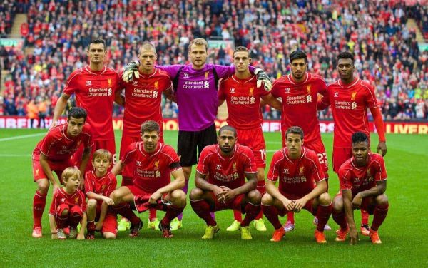 LIVERPOOL, ENGLAND - Sunday, August 10, 2014: Liverpool's players line up for a team group photograph before a preseason friendly match against Borussia Dortmund at Anfield. Back row L-R: Dejan Lovren, Martin Skrtel, goalkeeper Simon Mignolet, Jordan Henderson, Emre Can, Daniel Sturridge. Front row L-R: Philippe Coutinho Correia, captain Steven Gerrard, Glen Johnson, Javier Manquillo, Raheem Sterling. (Pic by David Rawcliffe/Propaganda)