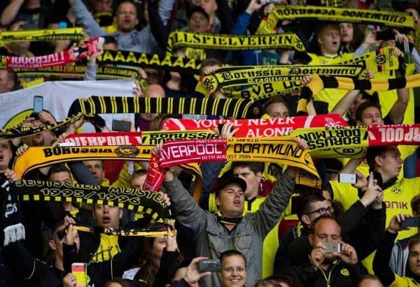 LIVERPOOL, ENGLAND - Sunday, August 10, 2014: Borussia Dortmund supporters sing 'You'll Never Walk Alone' during a preseason friendly match against Liverpool at Anfield. (Pic by David Rawcliffe/Propaganda)