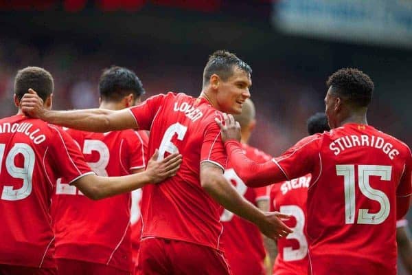 LIVERPOOL, ENGLAND - Sunday, August 10, 2014: Liverpool's Dejan Lovren celebrates scoring the second goal against Borussia Dortmund during a preseason friendly match at Anfield. (Pic by David Rawcliffe/Propaganda)