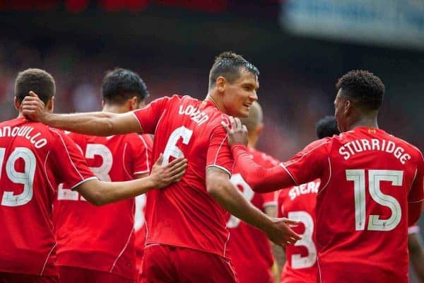 LIVERPOOL, ENGLAND - Sunday, August 10, 2014: Liverpool's Dejan Lovren celebrates scoring the second goal against Borussia Dortmund during a preseason friendly match at Anfield. (Pic by David Rawcliffe/Propaganda)