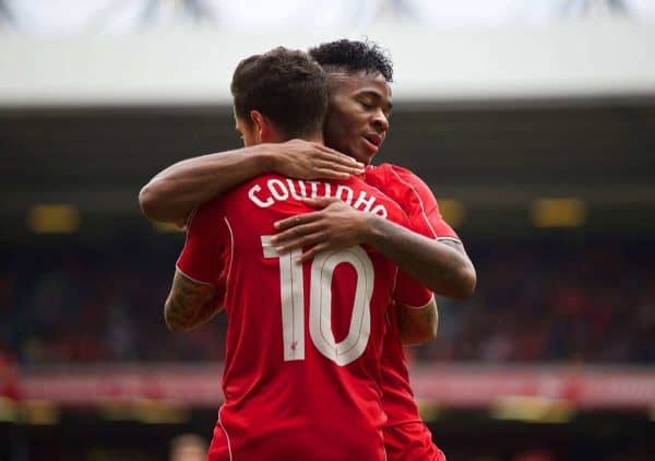 LIVERPOOL, ENGLAND - Sunday, August 10, 2014: Liverpool's Philippe Coutinho Correia celebrates scoring the third goal against Borussia Dortmund with team-mate Raheem Sterling during a preseason friendly match at Anfield. (Pic by David Rawcliffe/Propaganda)