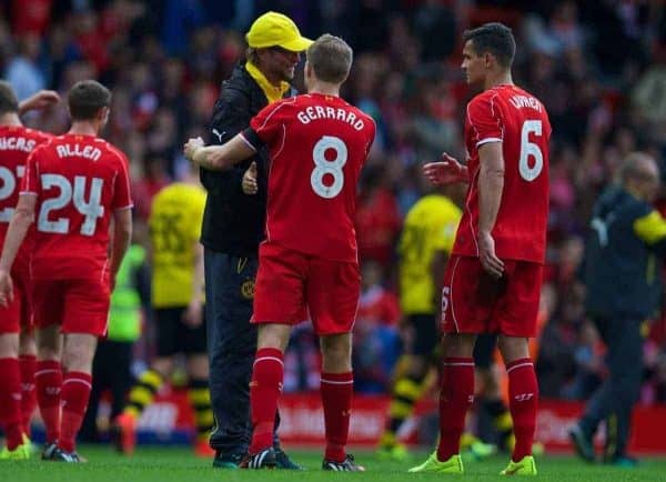 LIVERPOOL, ENGLAND - Sunday, August 10, 2014: Liverpool's captain Steven Gerrard and Borussia Dortmund's head coach Jurgen Klopp during a preseason friendly match at Anfield. (Pic by David Rawcliffe/Propaganda)