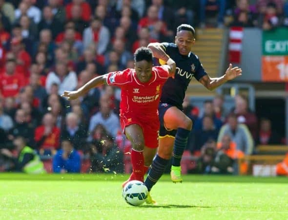 LIVERPOOL, ENGLAND - Sunday, August 17, 2014: Liverpool's Raheem Sterling in action against Southampton's Nathaniel Clyne during the Premier League match at Anfield. (Pic by David Rawcliffe/Propaganda)