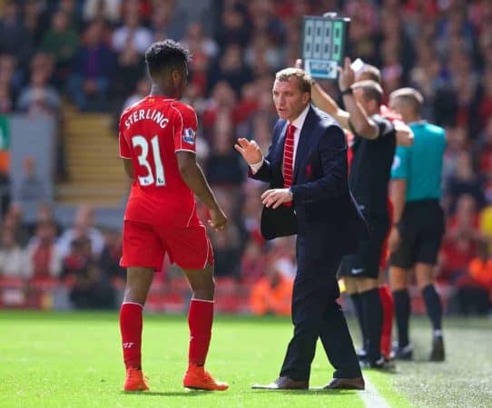 LIVERPOOL, ENGLAND - Sunday, August 17, 2014: Liverpool's manager Brendan Rodgers gives instructions to Raheem Sterling during the Premier League match against Southampton at Anfield. (Pic by David Rawcliffe/Propaganda)