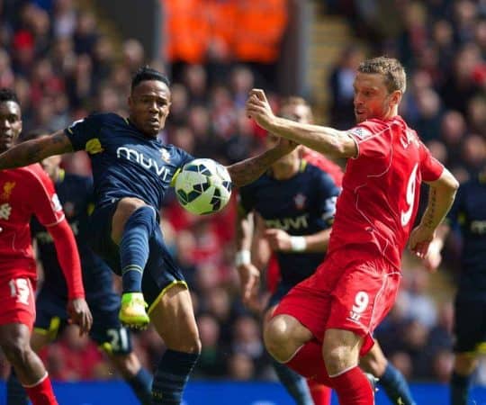 LIVERPOOL, ENGLAND - Sunday, August 17, 2014: Liverpool's Rickie Lambert in action against Southampton's Nathaniel Clyne during the Premier League match at Anfield. (Pic by David Rawcliffe/Propaganda)