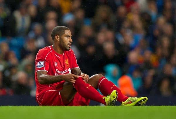 MANCHESTER, ENGLAND - Monday, August 25, 2014: Liverpool's Glen Johnson injured during the Premier League match against Manchester City at the City of Manchester Stadium. (Pic by David Rawcliffe/Propaganda)