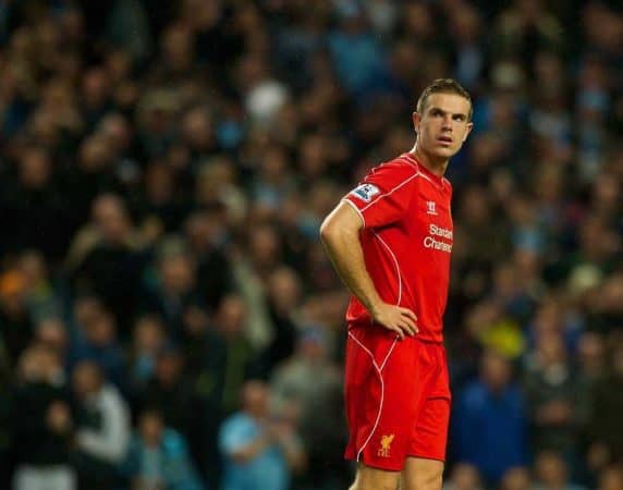 MANCHESTER, ENGLAND - Monday, August 25, 2014: Liverpool's Jordan Henderson looks dejected as Manchester City score the third goal during the Premier League match at the City of Manchester Stadium. (Pic by Chris Brunskill/Propaganda)