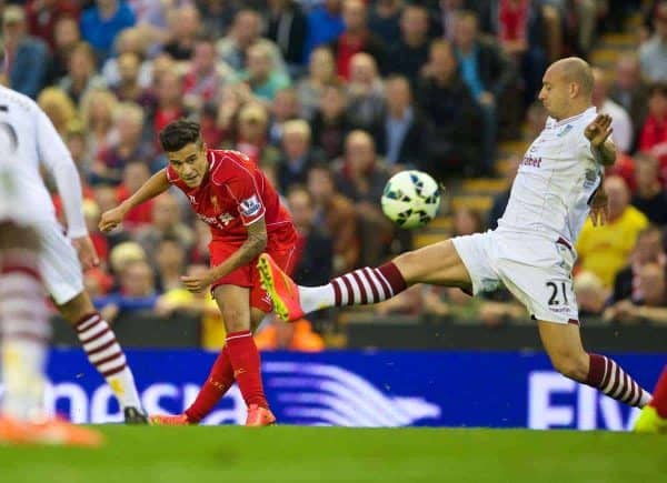 LIVERPOOL, ENGLAND - Saturday, September 13, 2014: Liverpool's Philippe Coutinho Correias his shot hit the Aston Villa post during the Premier League match at Anfield. (Pic by David Rawcliffe/Propaganda)