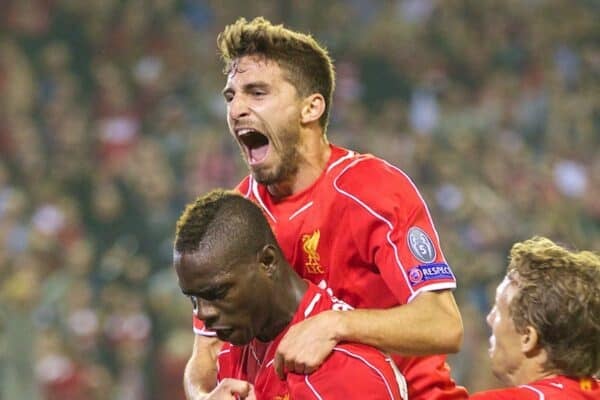 LIVERPOOL, ENGLAND - Tuesday, September 16, 2014: Liverpool's Mario Balotelli celebrates scoring the first goal against PFC Ludogorets Razgrad with team-mates Fabio Borini and Lucas Leiva during the UEFA Champions League Group B match at Anfield. (Pic by David Rawcliffe/Propaganda)