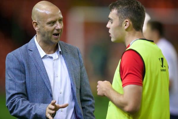 ANFIELD, ENGLAND - Thursday, October 16, 2014: Former Liverpool player Rob Jones with Connor Randall during the Under 21 FA Premier League match between Liverpool and Southampton at Anfield. (Pic by David Rawcliffe/Propaganda)