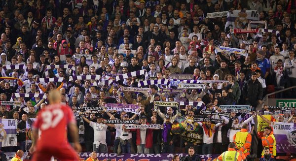 LIVERPOOL, ENGLAND - Wednesday, October 22, 2014: Real Madrid CF supporters celebrate as their side beat Liverpool 3-0 during the UEFA Champions League Group B match at Anfield. (Pic by David Rawcliffe/Propaganda)