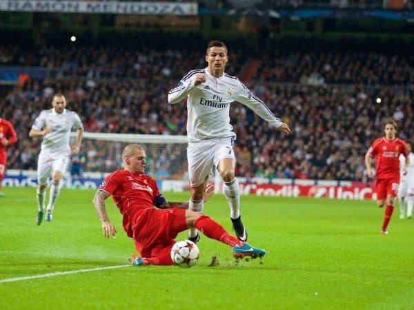 MADRID, SPAIN - Tuesday, November 4, 2014: Liverpool's captain Martin Skrtel tackles Real Madrid's Cristiano Ronaldo during the UEFA Champions League Group B match at the Estadio Santiago Bernabeu. (Pic by David Rawcliffe/Propaganda)