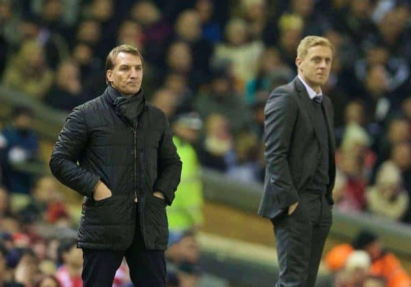 LIVERPOOL, ENGLAND - Monday, December 29, 2014: Liverpool's manager Brendan Rodgers and Swansea City's manager Garry Monk during the Premier League match at Anfield. (Pic by David Rawcliffe/Propaganda)