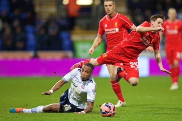 BOLTON, ENGLAND - Wednesday, February 4, 2015: Liverpool's Joe Allen is fouled by Bolton Wanderers' Neil Danns, who was subsequently sent off, during the FA Cup 4th Round Replay match at the Reebok Stadium. (Pic by David Rawcliffe/Propaganda)